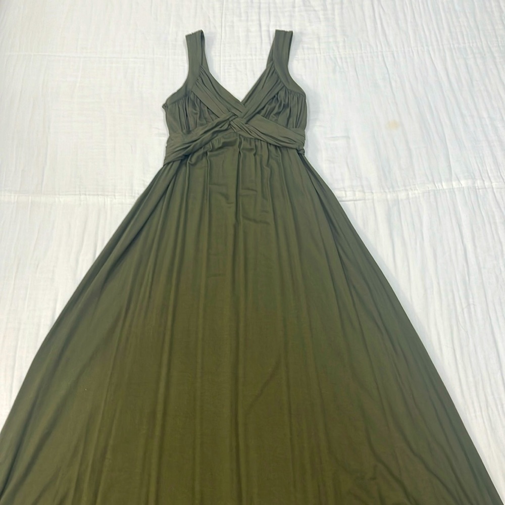 Ankle length, olive green dress.